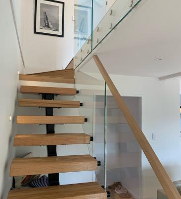 Timber handrail on Glass